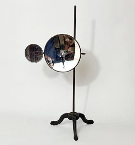 Concave Mirrors On Decorative Stand