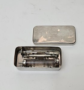 Syringe In Metal Case