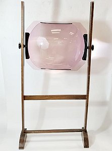 Large magnifier on wood stand