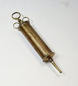 Large brass syringe