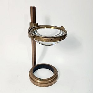 Large bulls eye lens on stand