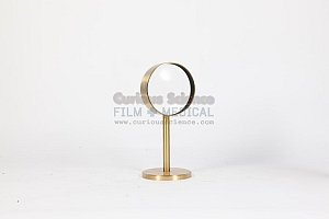 Magnifier on brass stand