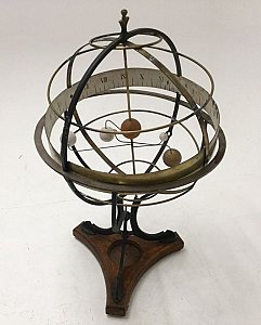 Armillary sphere on stand.