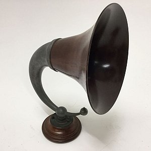 Amplification horn on wooden stand