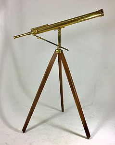 Brass telescope on wooden tripod