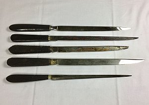 Ebony-handled knives