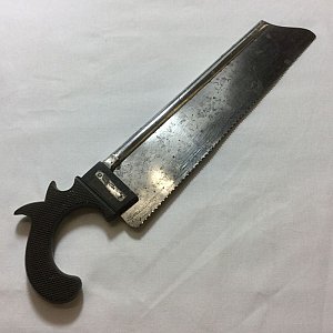 Pistol grip amputation saw