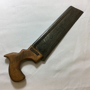 Pistol grip amputation saw