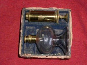Antique breast pump, glass and laquered brass