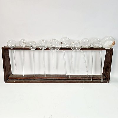 Selection Of Glass Alembics In Rack
