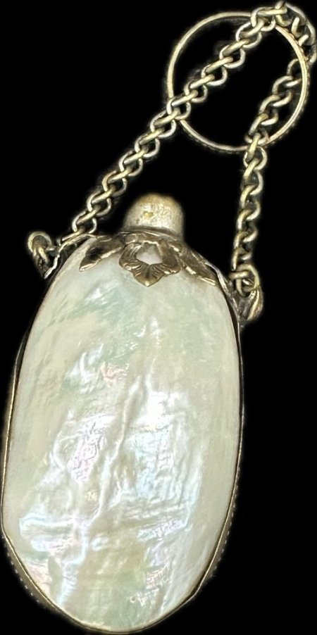 Small scent bottle and chain