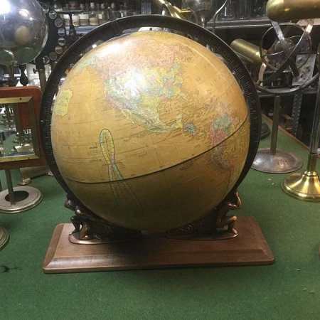 Globe on wooden stand