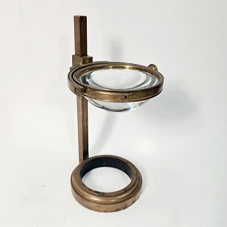 Large bulls eye lens on stand