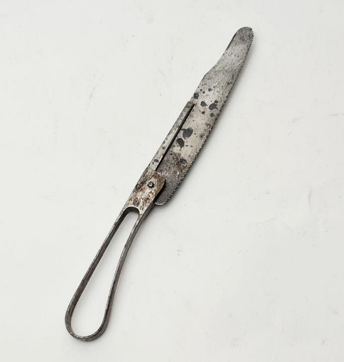 Aged Steel Finger Saw