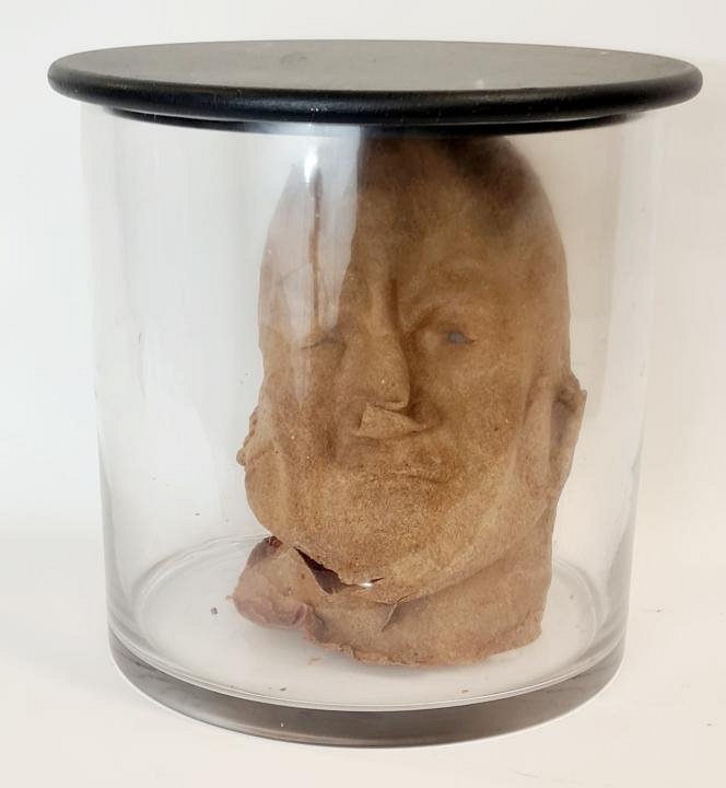 Deformed Head In Glass Jar