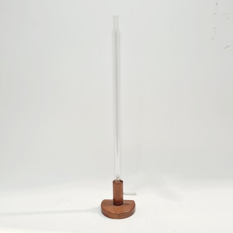 Glass Column On Wooden Base