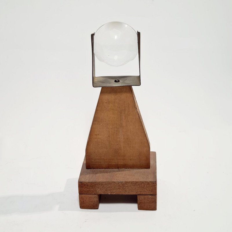 Lens In Wooden Stand