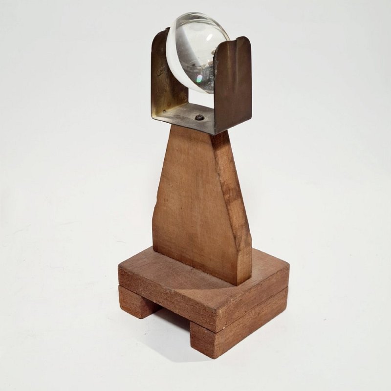 Lens In Wooden Stand