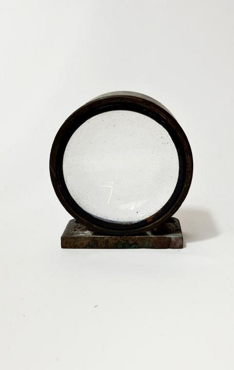 Lens In Bronze Stand