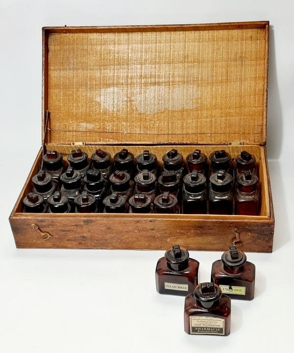 Wooden Box Of Brown Bottles
