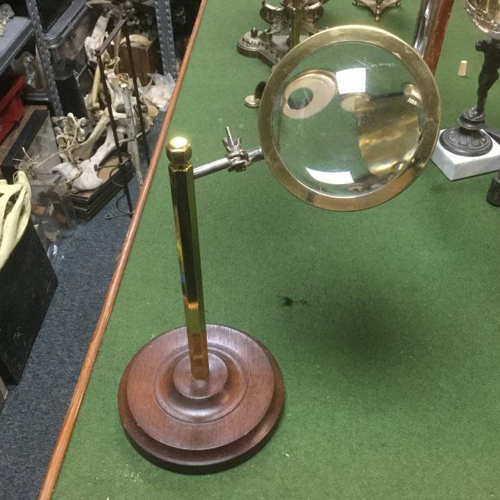 Magnifier on articulated brass stand