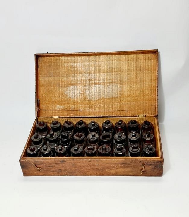 Wooden Box Of Brown Bottles