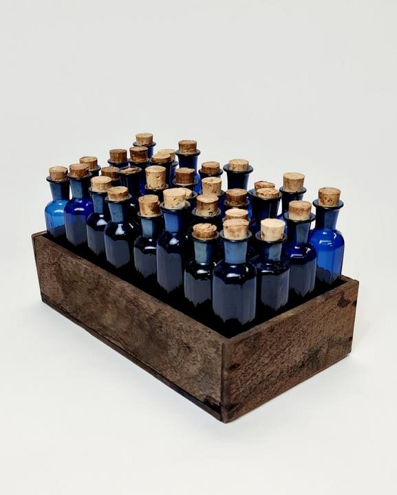 Small Wooden Crate Of Blue Bottles