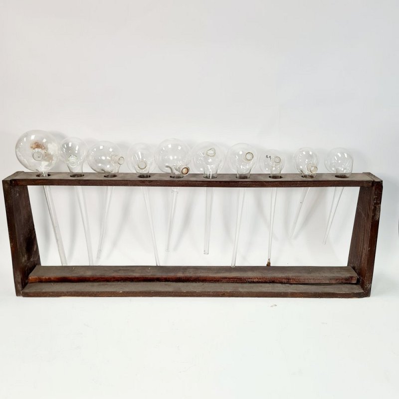 Selection Of Glass Alembics In Rack