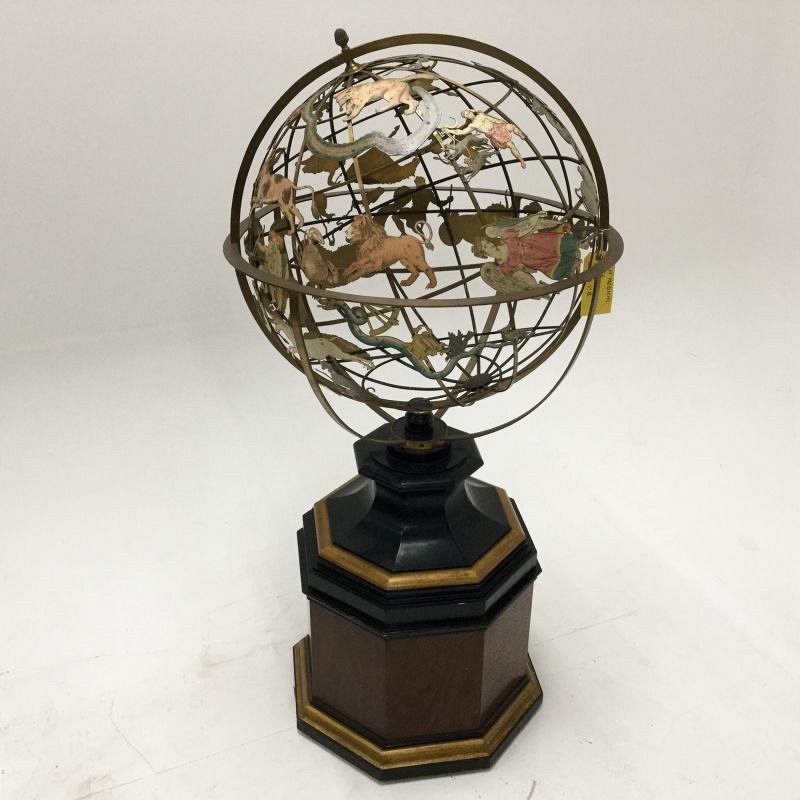 Large astrology/zodiac globe on stand.