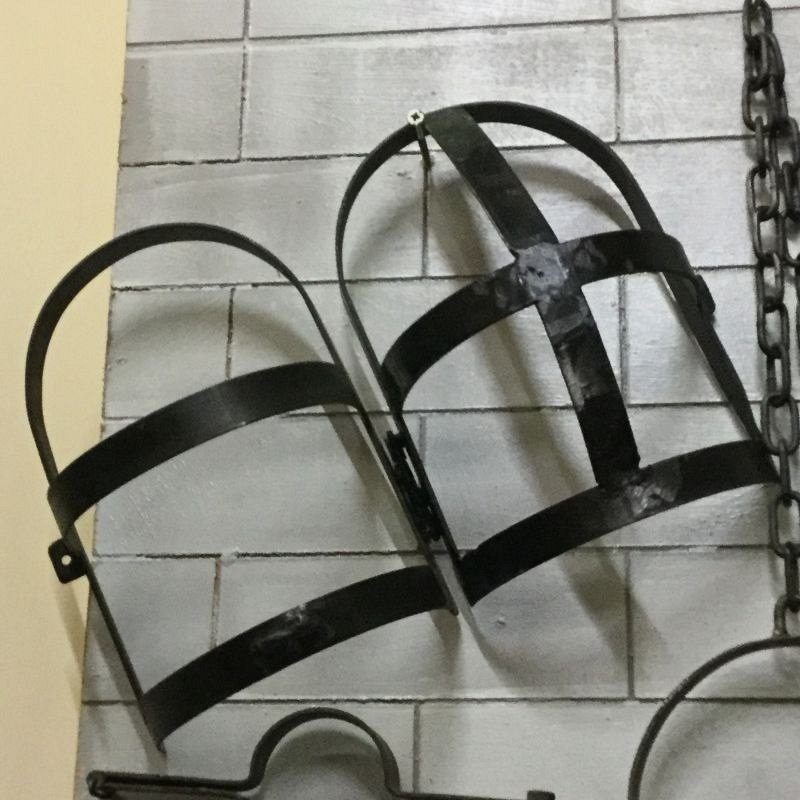 Wrought iron head restraint