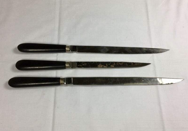 Ebony-handled knives